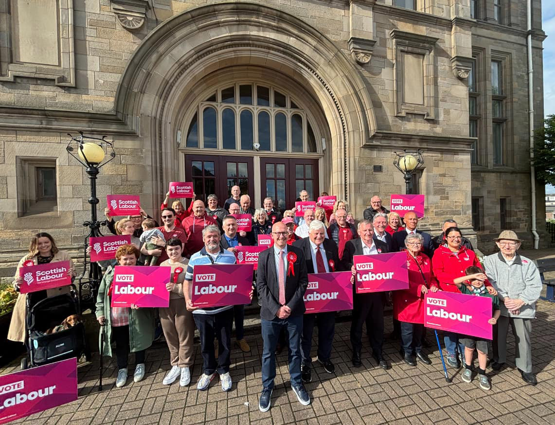 Falkirk Labour candidate for Alloa and Grangemouth, Brian Leishman with campaigners outside the Alloa town hall